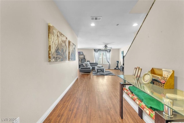 hallway featuring wood-type flooring