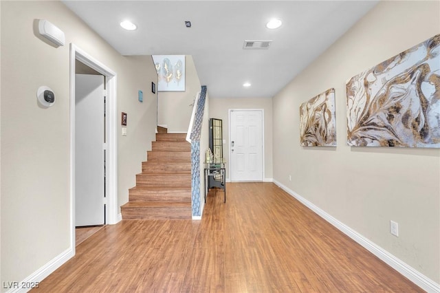 entryway featuring wood-type flooring