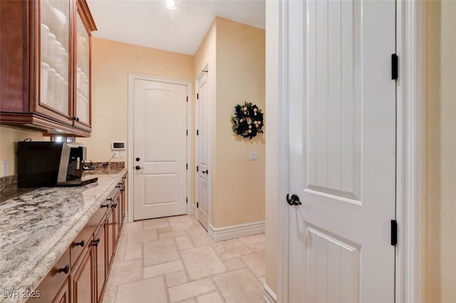 interior space featuring light stone countertops