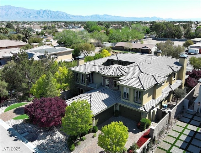 aerial view featuring a residential view and a mountain view