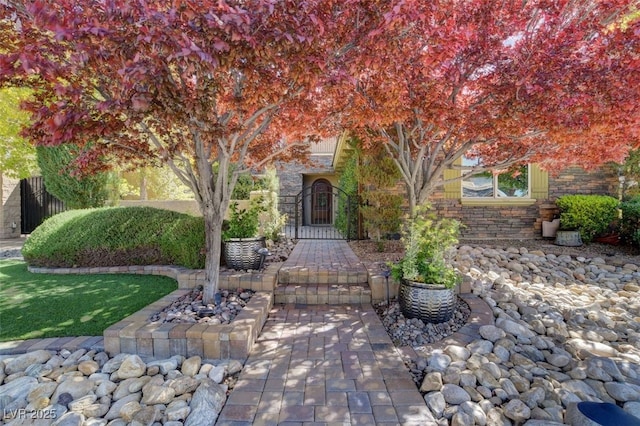 view of patio / terrace featuring a gate and fence