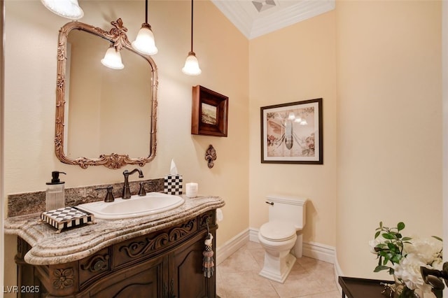 4450 Palisades Canyon Cir, Las Vegas, NV 89129 - bathroom featuring vanity, toilet, crown molding, baseboards, and tile patterned flooring
