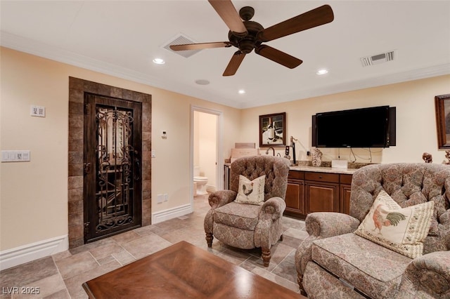 4450 Palisades Canyon Cir, Las Vegas, NV 89129 - living area featuring a ceiling fan, baseboards, recessed lighting, and ornamental molding