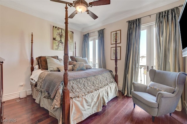 bedroom with ceiling fan, multiple windows, dark hardwood / wood-style flooring, and ornamental molding