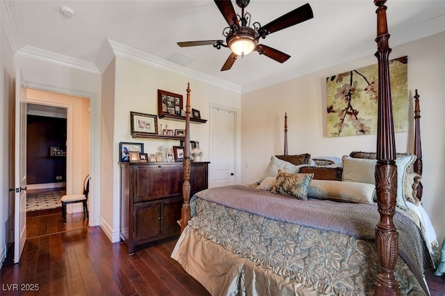 bedroom featuring crown molding, ceiling fan, and dark hardwood / wood-style flooring