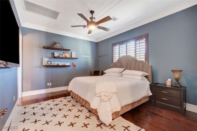 bedroom with dark wood-type flooring, visible vents, and baseboards