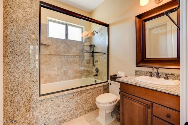 full bath with enclosed tub / shower combo, toilet, tile patterned flooring, and vanity