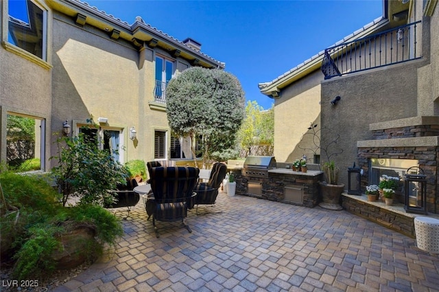 4450 Palisades Canyon Cir, Las Vegas, NV 89129 - view of patio featuring a fireplace