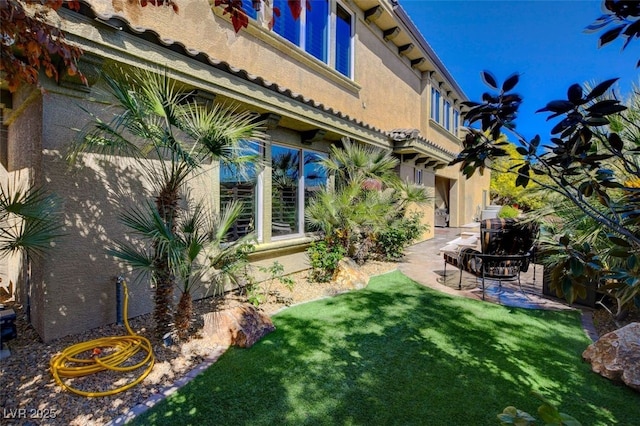 4450 Palisades Canyon Cir, Las Vegas, NV 89129 - view of green lawn with a patio area
