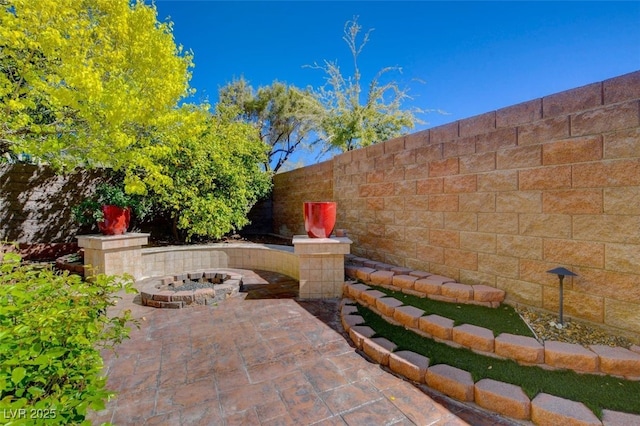 4450 Palisades Canyon Cir, Las Vegas, NV 89129 - view of patio featuring a fire pit