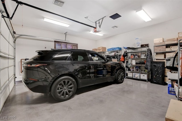 4450 Palisades Canyon Cir, Las Vegas, NV 89129 - garage featuring a garage door opener