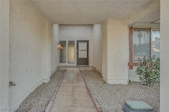 doorway to property featuring a patio