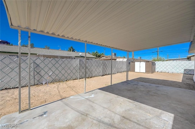 view of patio / terrace with a storage shed