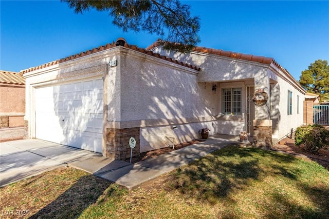 view of side of home featuring a garage