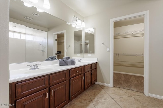 bathroom with vanity and tile patterned floors