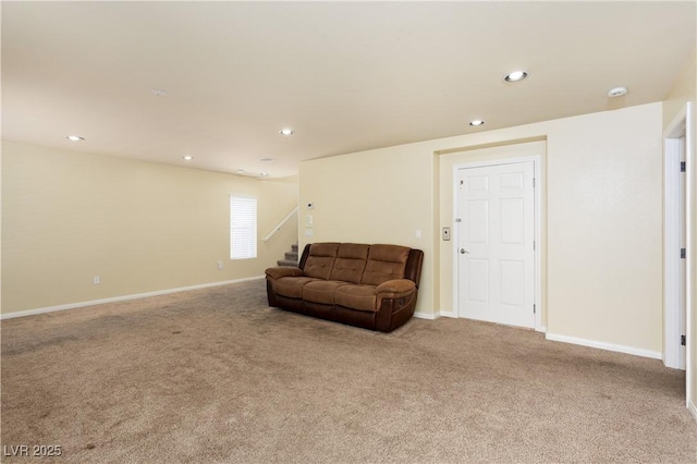 living area featuring light carpet