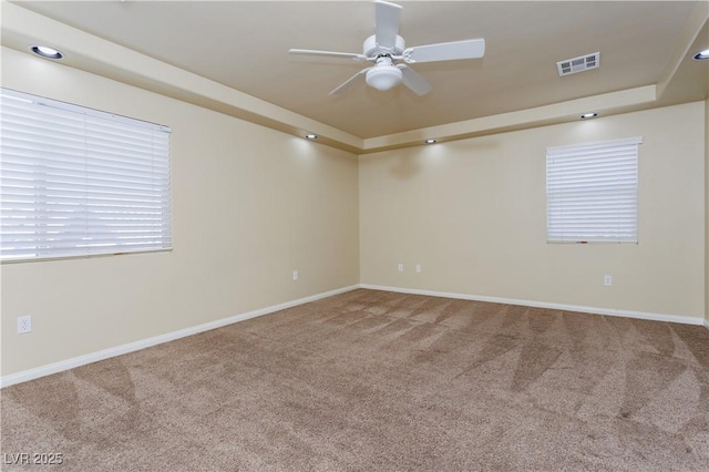 empty room with carpet floors and ceiling fan