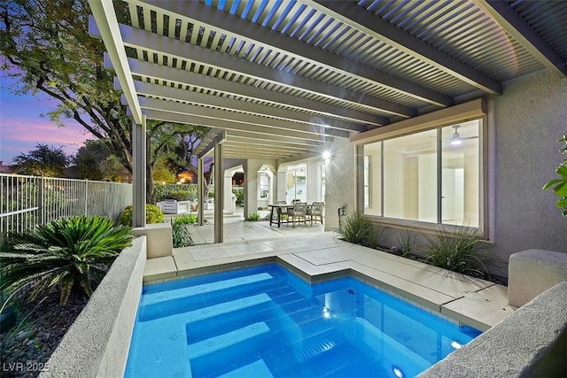 pool at dusk with a patio area, a hot tub, and a pergola