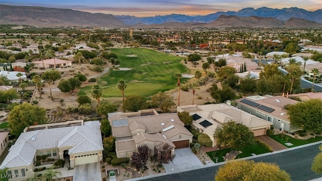 aerial view at dusk with a mountain view