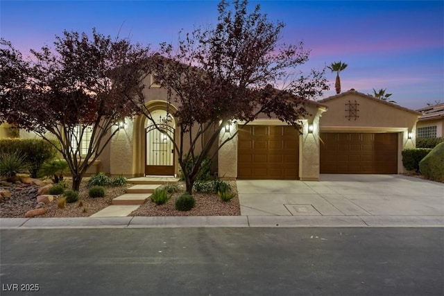 view of front of home with a garage