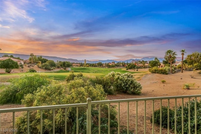 yard at dusk with a mountain view