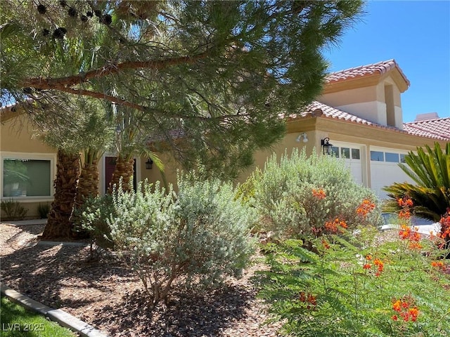 view of home's exterior featuring a garage