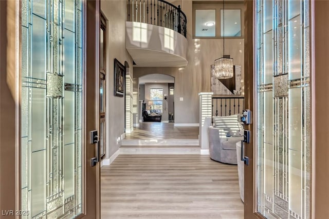 entrance foyer with light hardwood / wood-style floors