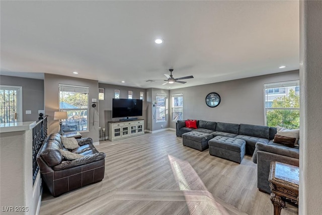 living room featuring ceiling fan