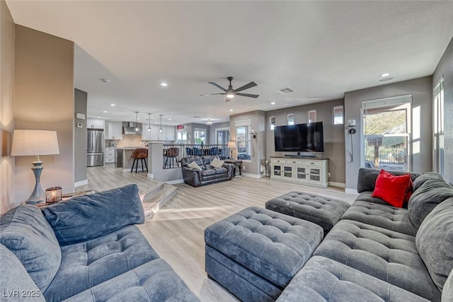 living room featuring light wood-type flooring