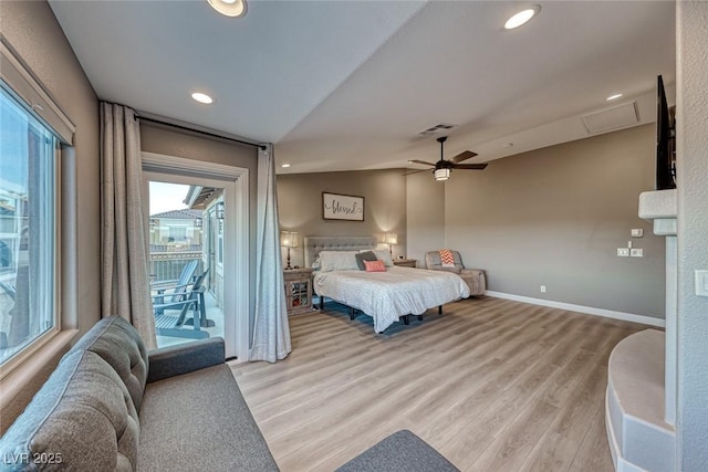 bedroom featuring light wood-type flooring, access to exterior, ceiling fan, and vaulted ceiling