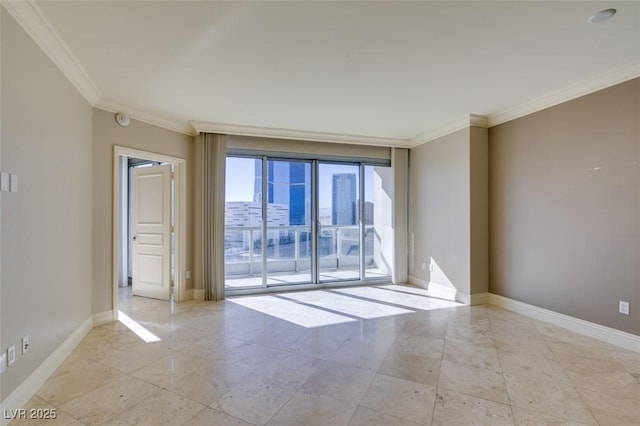 unfurnished room with crown molding