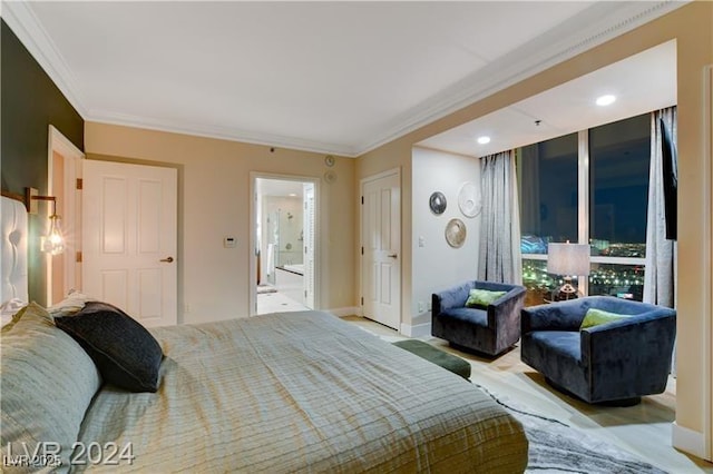 bedroom with light hardwood / wood-style flooring and ornamental molding