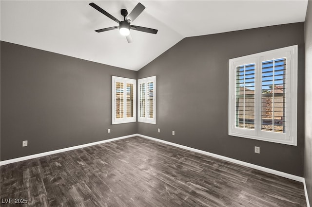 unfurnished room with ceiling fan, dark hardwood / wood-style floors, and vaulted ceiling