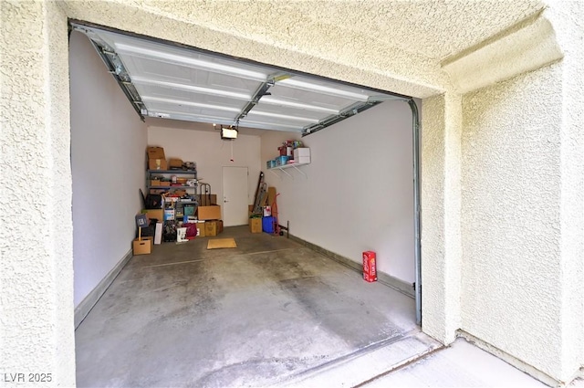 garage featuring a garage door opener