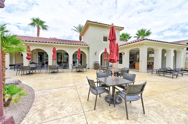 rear view of house featuring a patio area