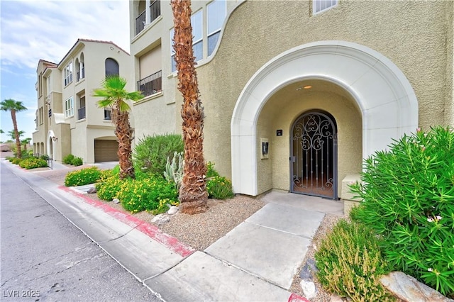 property entrance with a garage