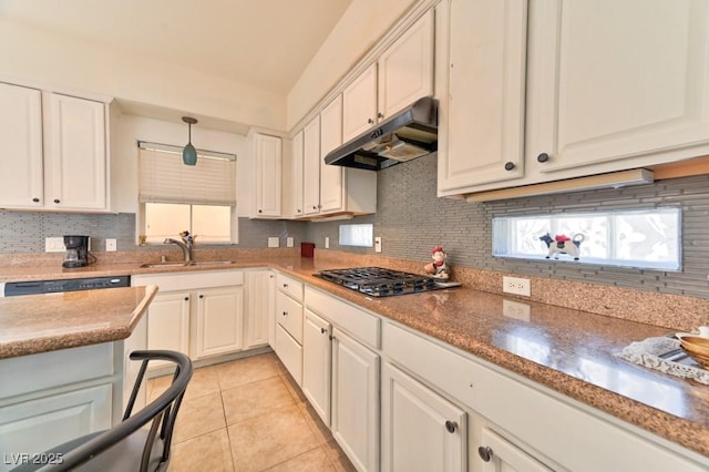 kitchen with white cabinetry, light tile patterned floors, pendant lighting, and stainless steel gas stovetop