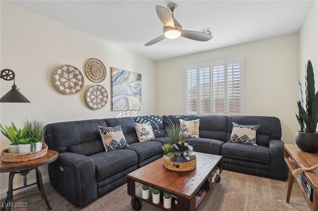 carpeted living room featuring ceiling fan