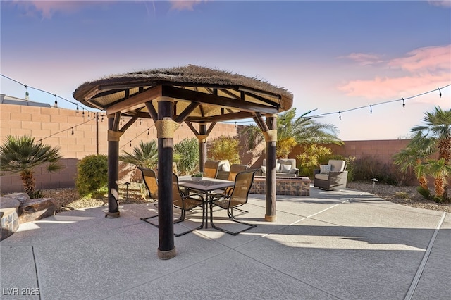 patio terrace at dusk with a gazebo