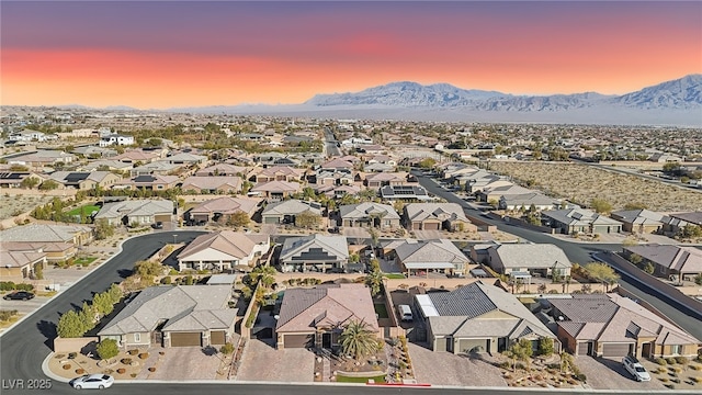 aerial view at dusk with a mountain view