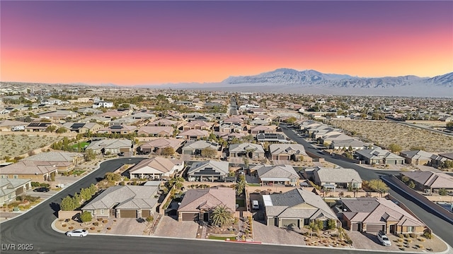 aerial view at dusk with a mountain view