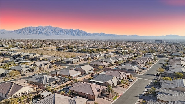 aerial view at dusk with a mountain view