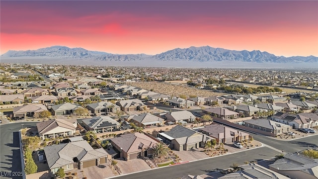 aerial view at dusk with a mountain view