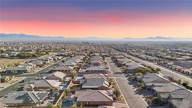 aerial view at dusk with a mountain view