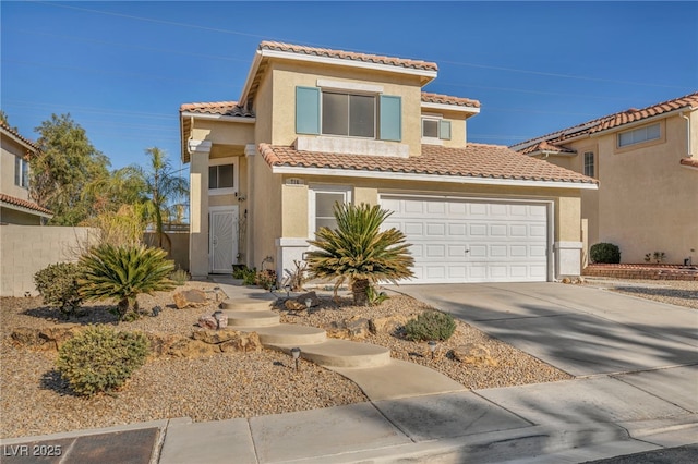 mediterranean / spanish-style home featuring a garage