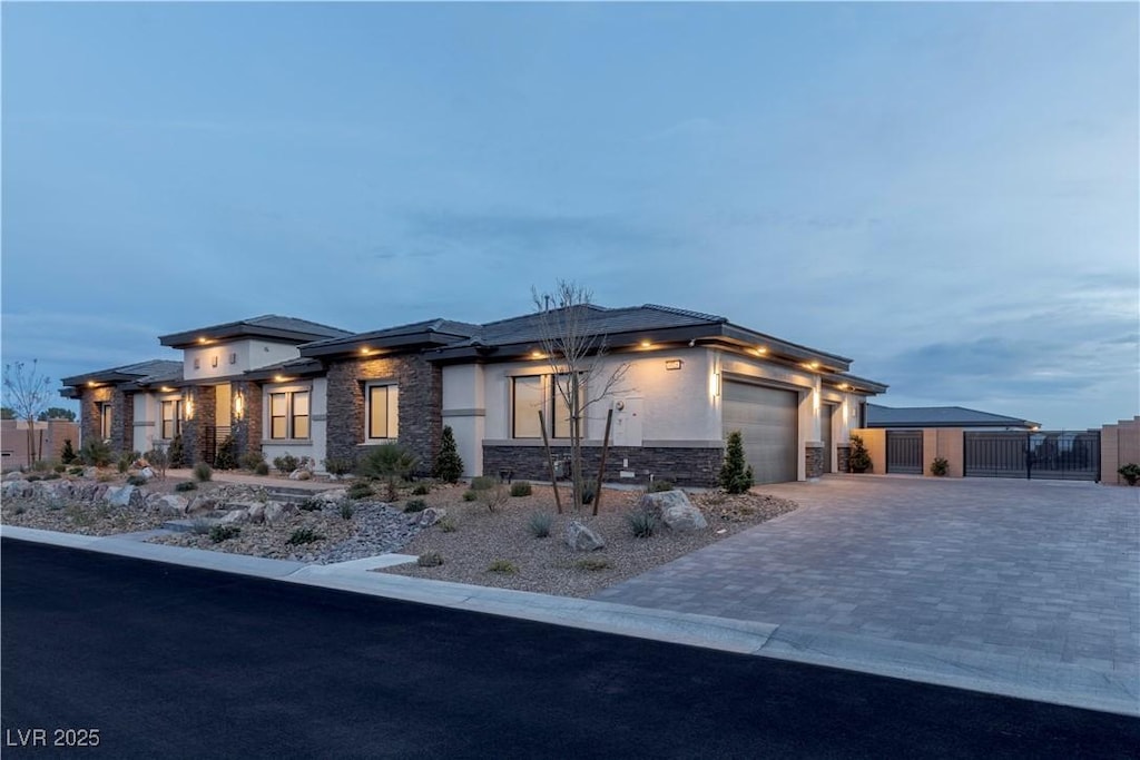 prairie-style home featuring a garage