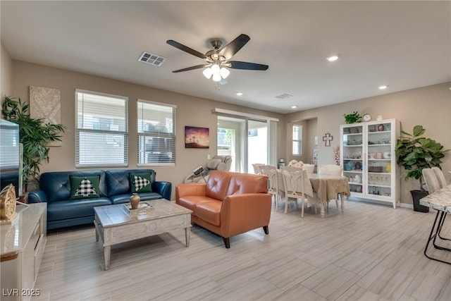 living room featuring ceiling fan