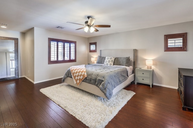 bedroom featuring dark wood-type flooring and ceiling fan