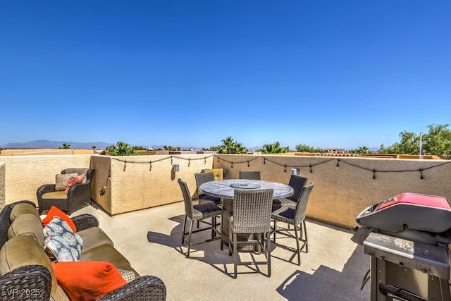 view of patio featuring an outdoor living space and grilling area