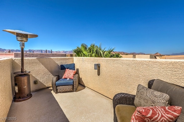 view of patio / terrace with a balcony